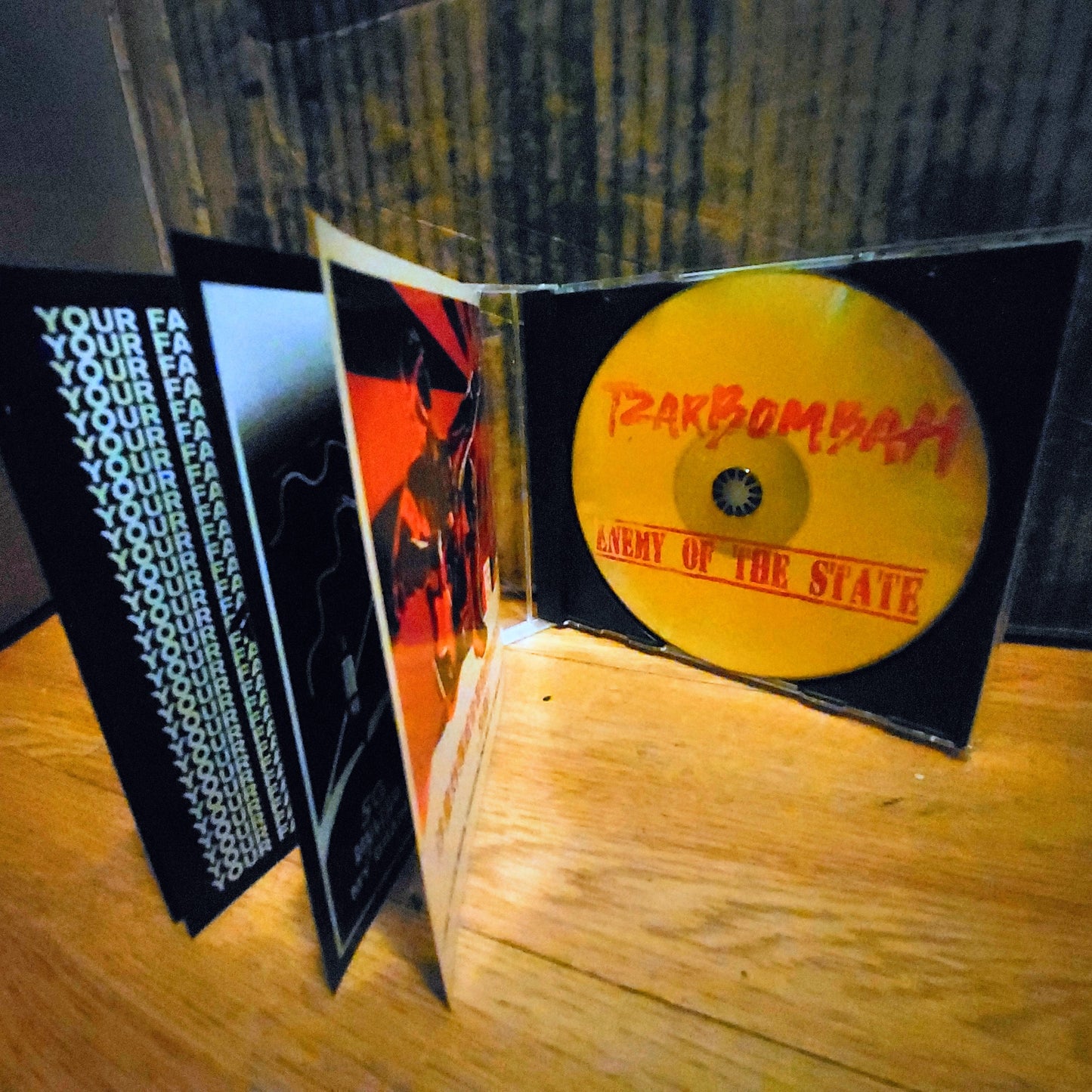 Tzarbombah Enemy of the State interior and disk